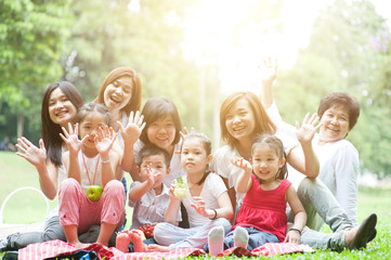 Asian multi generations family outdoor fun