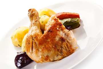 Roast chicken leg with potatoes