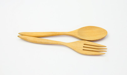 wooden spoon and fork on white background