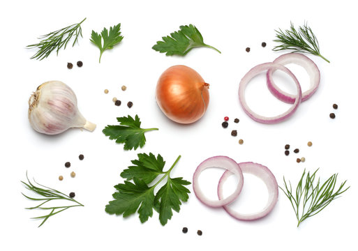 red onion, garlic and spices isolated on white background, top view