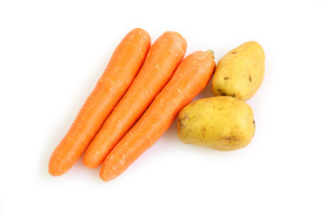carrot and potatoes on white plate