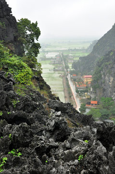 Panorama view of rice fields and limestone rocks and from Hang Mua Temple viewpoint