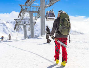 skier on the background of cable car,first may 2016