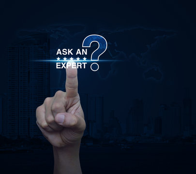 Hand pressing ask an expert with star and question mark sign icon over world map and modern city tower, Elements of this image furnished by NASA
