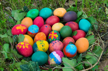Fototapeta na wymiar Hand painted Easter eggs hidden on the grass