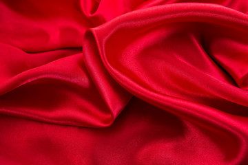 Obraz premium Red cloth waves background texture.Red cloth background