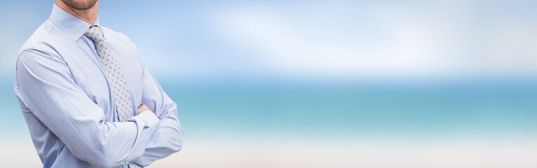  Serious manager with arms crossed in warehouse