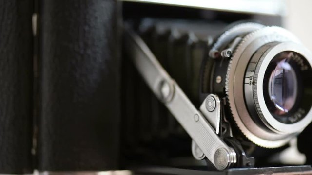 Old photo camera shutter which is triggered