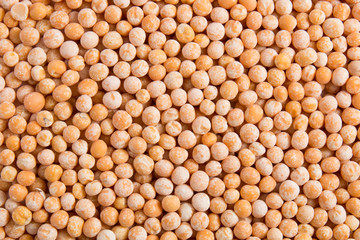 Food background of yellow grain peas