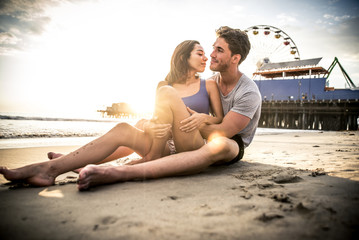 Fototapeta premium Happy couple spending time in Santa monica