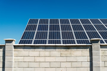 Fototapeta premium Solar panel, photovoltaic, alternative electricity source - selective focus, copy space