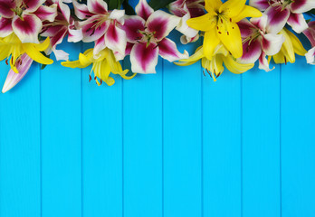  lily flowers on wooden planks