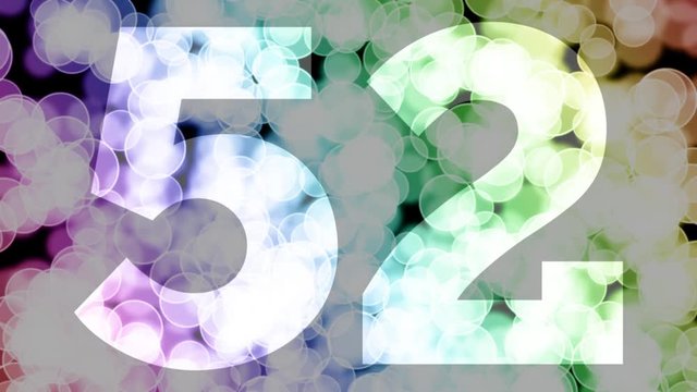 Fifty two to fifty three years birthday fade in/out animation with color gradient moving bokeh background. Animation: 90 frames still with number, 180 fade out, 30 clear, 180 fade in, 300 still.
