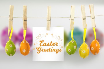 Composite image of easter greetings logo