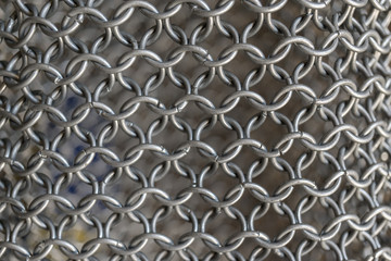 Texture of chainmail of a medieval armor knight, Pattern, background, closeup, detail