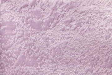 Light violet background from a soft upholstery textile material, closeup.