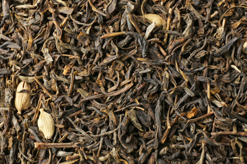 Dry tea leaves background