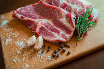 fresh raw meat is beautifully decorated pripravena cutting Board