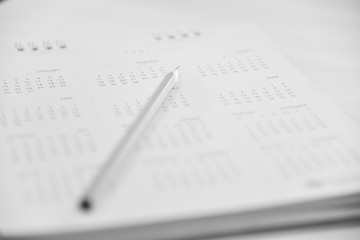 Fototapeta premium Blurred calendar page in planning concept black and white tone.