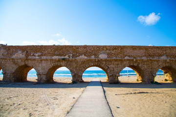 Ancient roman aqueduct in Caesarea, sightseeings in Israel.