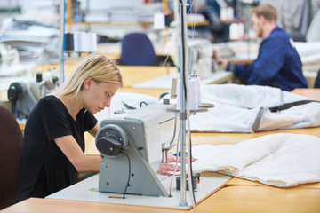 Seamstress textile factory - obrazy, fototapety, plakaty