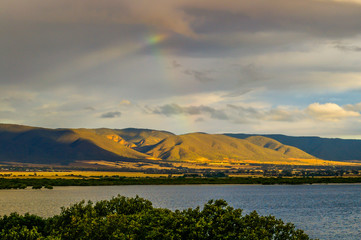 Storm front moving over Port Pirie bay bringing rain and rainbows to the Flinders Ranges