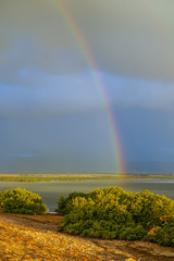 Storm front moving over Port Pirie bay bringing rain and rainbows to the Flinders Ranges