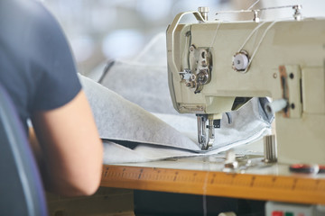 Seamstress worker in factory