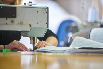 Seamstress worker in factory