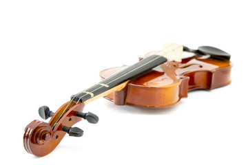Fototapeta na wymiar aged handmade violin on white background