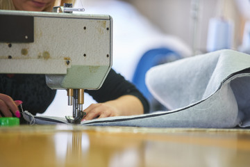Seamstress worker in factory