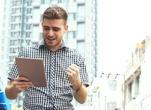 business man holding teblet