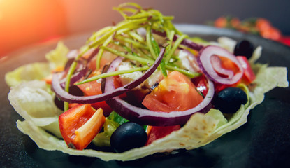 Greek salad from cabbage, olives and mozzarella