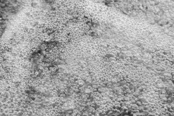 Rough water in close up with lots of bubbles