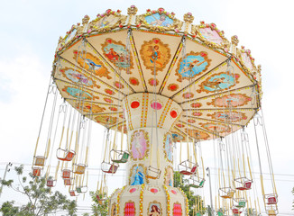 chain chair swing Carousel spinning in Thailand Children's Amusement Park  in Prachubkirikhan,...