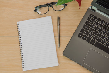 Book and notebook on wooden. Business Objects in the office .