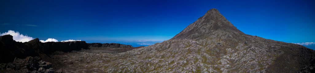 Panorama inside crater of Pico volcano and Piquinho pinnacle at Azores, Portugal