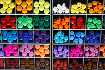Multicolored markers in store, closeup view