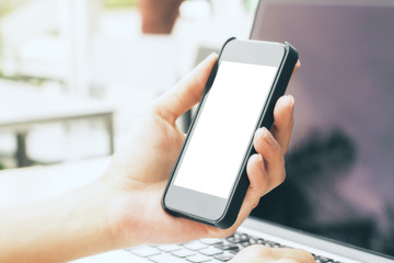 Girl using cellphone and notebook