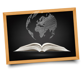 Globe on open book on blackboard background.