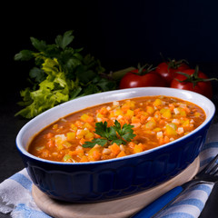 fish with vegetables in tomato sauce
