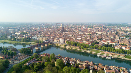 Fototapeta na wymiar Vista aerea di Pavia e del fiume Ticino, vista del Duomo di Pavia, Ponte Coperto e del Castello Visconteo. Lombardia, Italia
