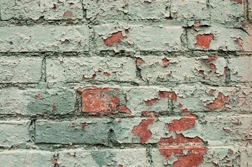 Peeling Paint on a Brick Wall