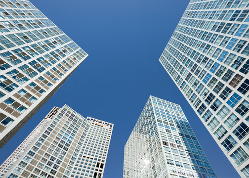 Group of skyscrapers against a blue sky