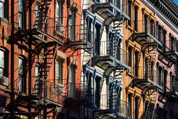 Wandcirkels aluminium Colorful Soho building facades with painted fire escapes. Manhattan, New York City © Francois Roux