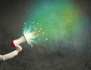 Hand holding megaphone