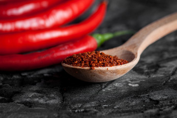 Red fresh chili on wood desk.