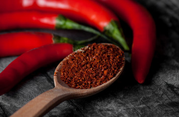 Red fresh chili on wood desk.