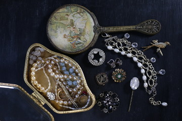 Vintage jewelry on black background 