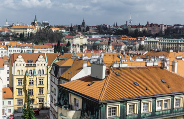 Fototapeta premium The view from VVyshegrad rock to city of Prague in the early spring on a sunny day. Area of the old town in Prague, Czech Republic.